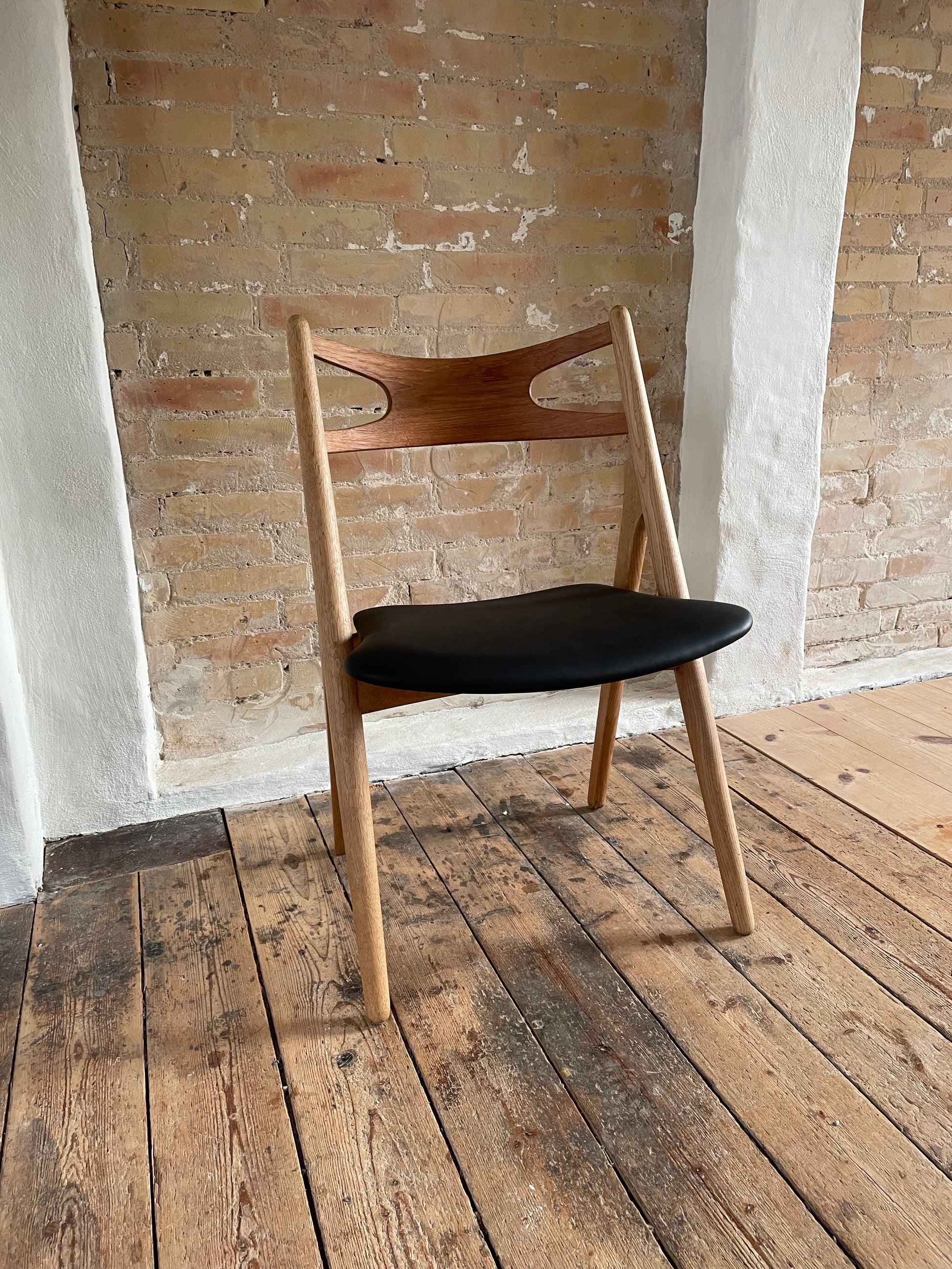 Ompolstring af Wegner savbukkestol