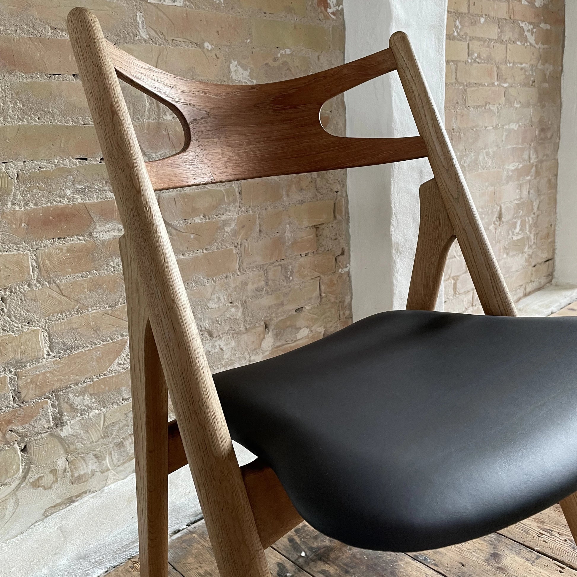 Ch29 ompolstret I sort læder